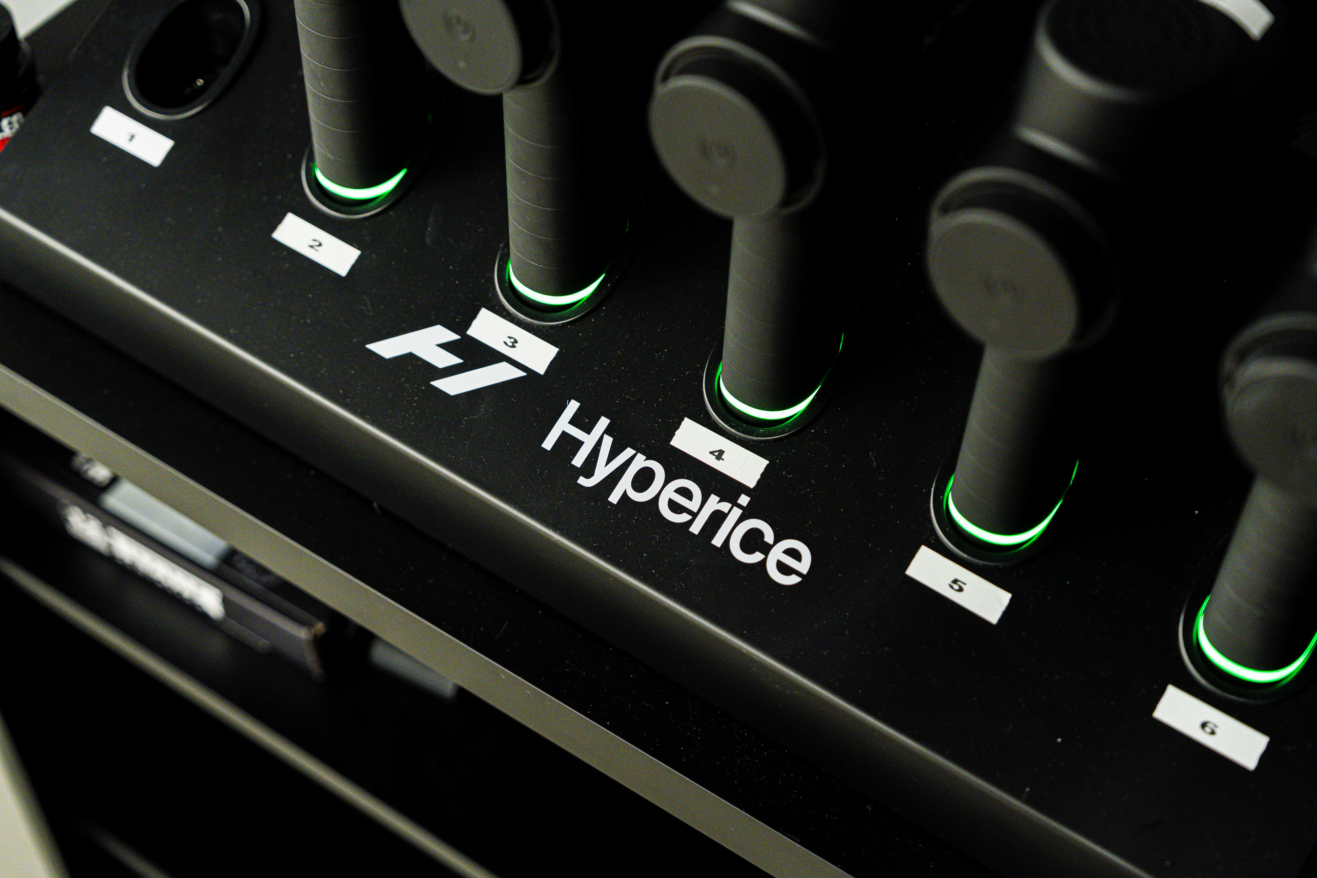 Hyperice percussion devices docked in the Camarillo recovery lounge