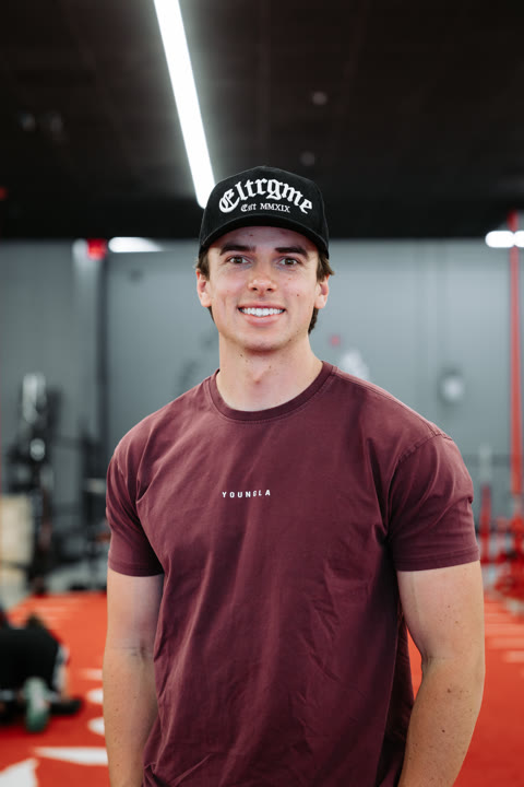 Miles, of the House of Gains Camarillo crew, on the red turf